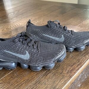 Nike women’s Black Flyknit VaporMax Athletic Shoes